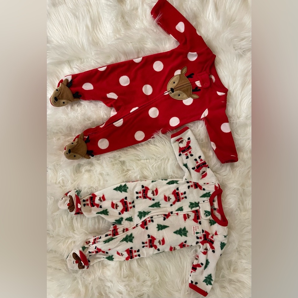 Two Carter Just One You-newborn baby Christmas zip up, long sleeved pajamas.